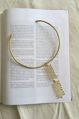 An elegant collar style contemporary necklace. Modern brass necklace or modern brass jewelry.