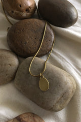 Handcrafted contemporary jewelry with a classic brass pendant. Contemporary necklace- Modern Brass Jewelry